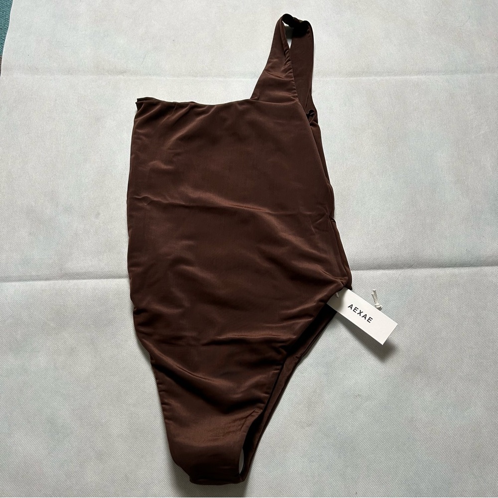 AEXAE brown one shoulder one piece swimsuit NWT